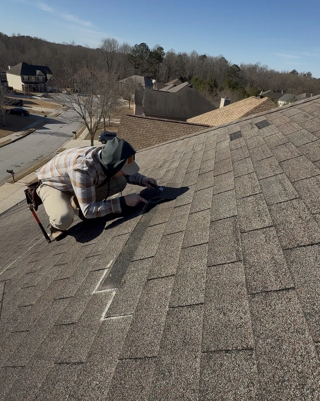 Dillon Booth, owner of Snapper Roofing